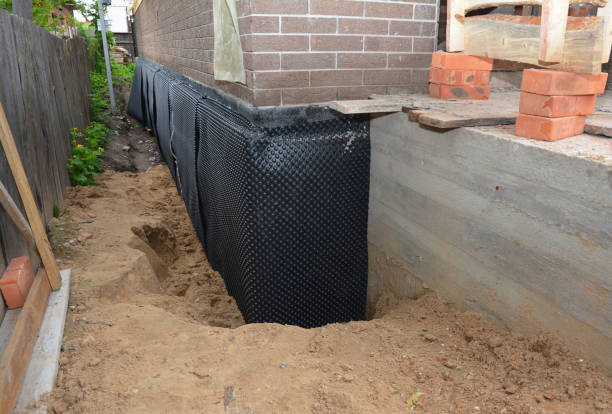 Happy homeowners after waterproofing job in Willernie
